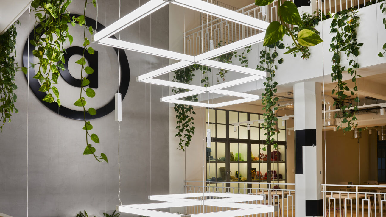 Geometric bar lights surrounded by hanging plants